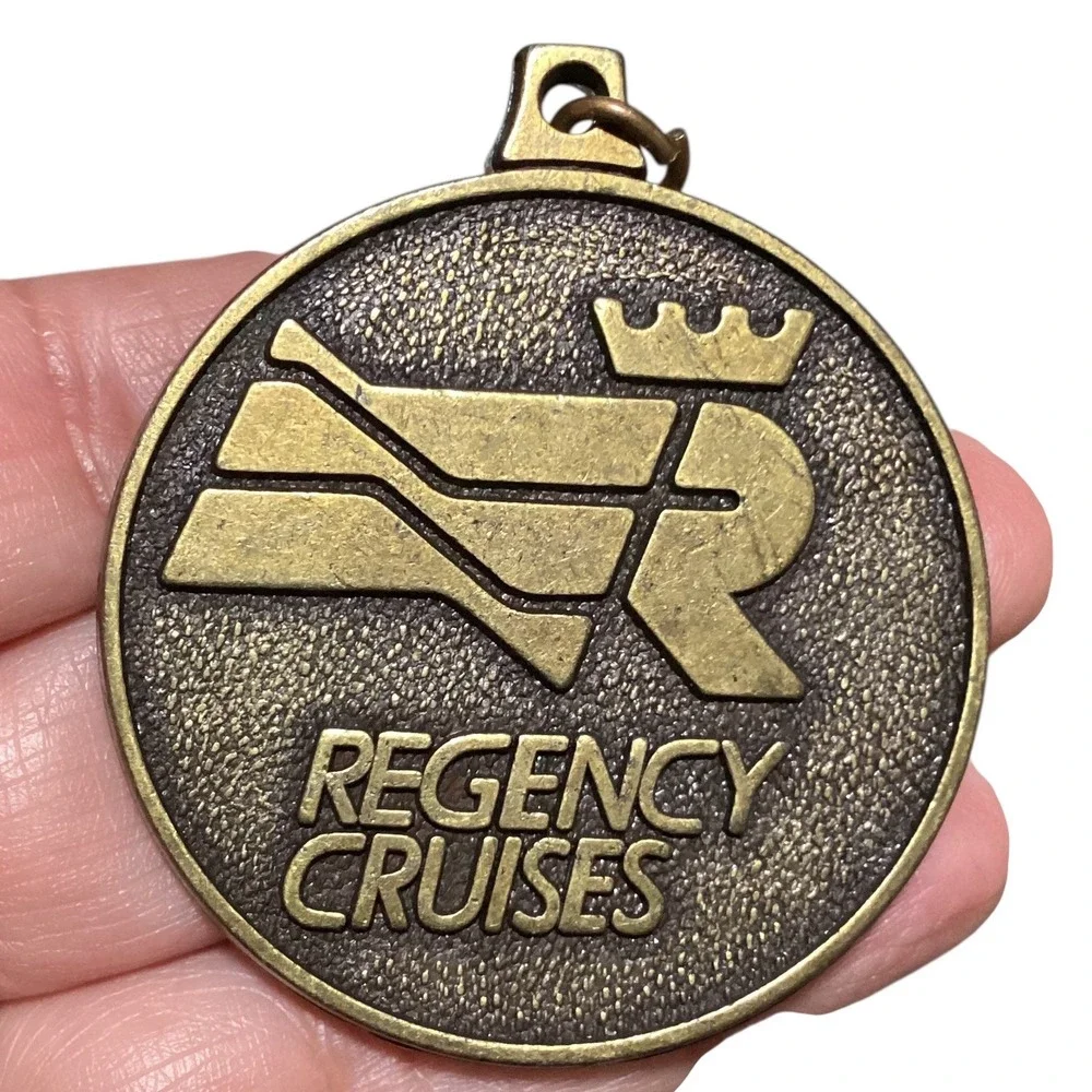 Regency Cruises Victory Medallion Souvenir Keychain Pendant Brass Tone USA